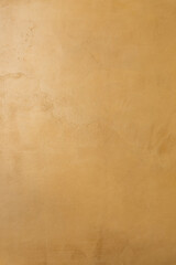 Mustard color microcement texture background
