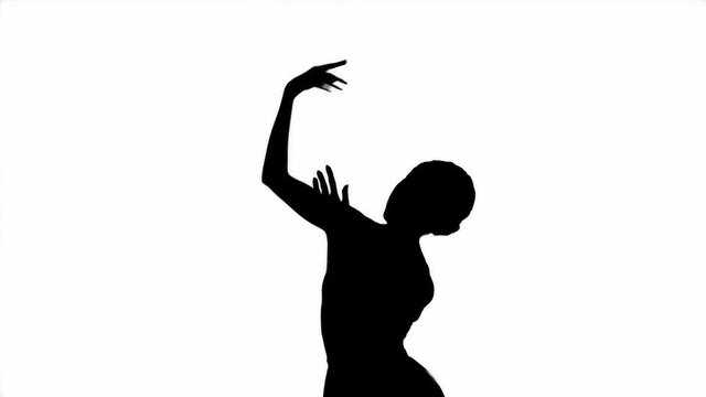 Silhouette of ballerina gesturing isolated on white 