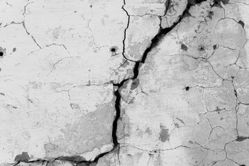 Crack in the white wall. The concept of schism or contradiction.