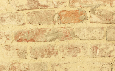 Brick wall background made of different  and textures