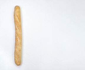 minimal style. French bread with sesame seeds. Crispy french baguette isolated on white background. Food and bakery concept. copy space, template.