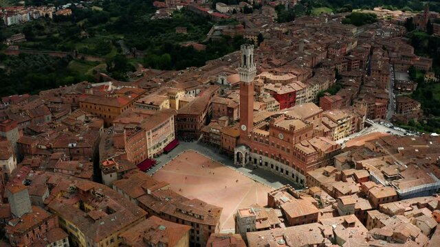 Aerial view of Siena Cathedral, Pullback Revealing City, Italy