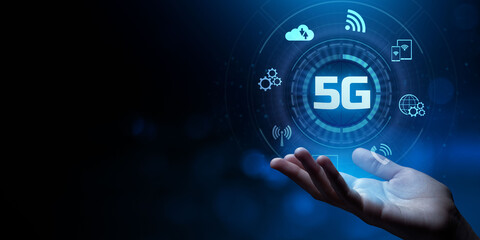 5G mobile internet connection five generation networking concept. Businessman pointing virtual screen.