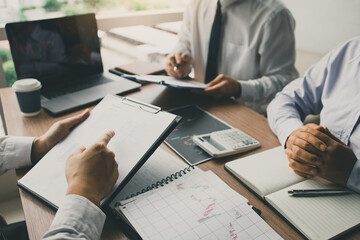 Businessmen explain about quarterly results with colleagues and entrepreneurs and are discussing...