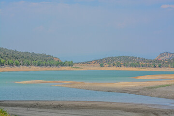 The low water level at Crawford Reservoir in Gunnison National Park, Colorado