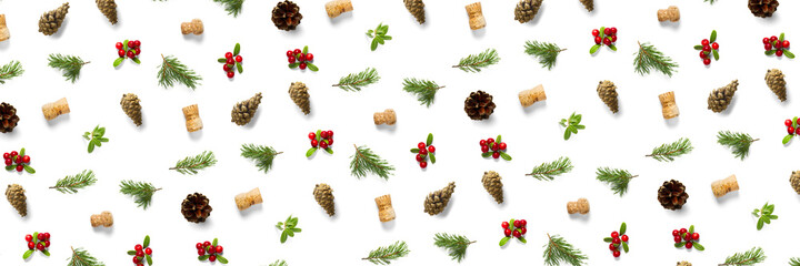 christmas background with pine cone, wine cork, pine twig and lingonberry. christmas background on white backdrop.
