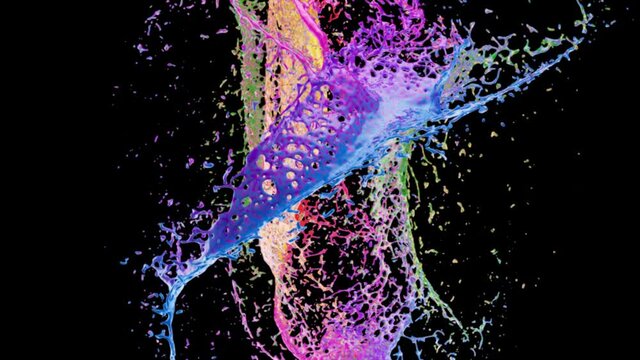 Colorful drops of liquid splashing and mixing in black background - graphics