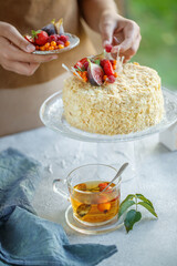 Napoleon cake. Beautiful cake with berries, classic pastries. High quality photo.