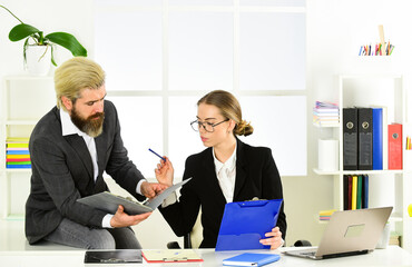 Man and woman boss manager director. Business couple working. Couple work in office. Law...