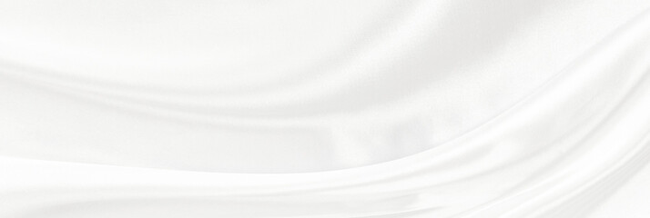 White gray satin texture that is white silver fabric silk panorama background with beautiful soft blur pattern natural.