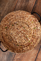 Digital backdrop for newborn photo shoot. Wicker basket on wooden background. 