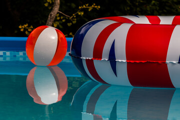 Floating Tire and Ball in the Pool