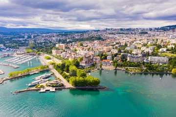 Foto op Plexiglas Picturesque aerial view from lake Geneva of Swiss town of Lausanne © JackF