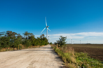 Fototapeta na wymiar Wind turbines , wind farm in Botievo, Ukraine. Green sustainable energy.