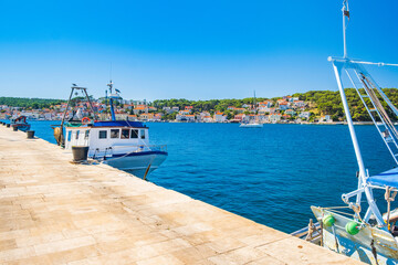 Fototapeta na wymiar Fishing boats on the seafront in town of Mali Losinj on the island of Losinj, Adriatic coast in Croatia 