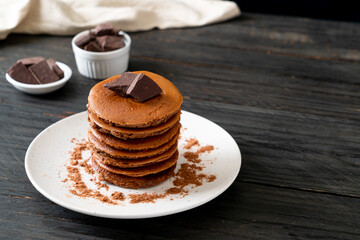 chocolate pancake stack on plate