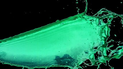 Neon green liquid being thrown in black background - slow motion - Powered by Adobe