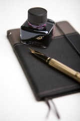 ink and fountain pen on note