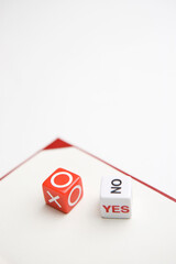 YES' or 'NO' and 'X' or 'O' dice
