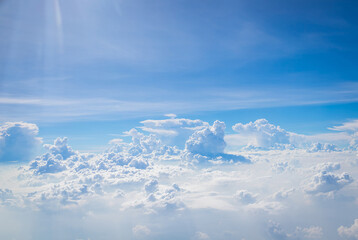 Sky and clouds from above the ground viewed from an airplane