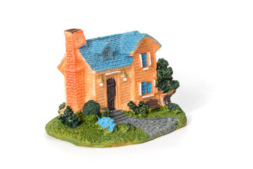 Mini house model on white background