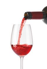 red wine pouring in glass