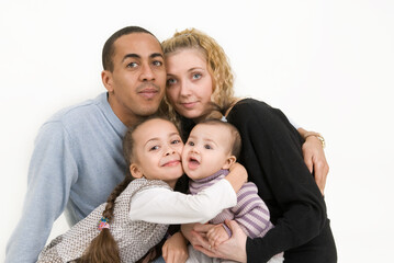 Fototapeta na wymiar Multiracial family with two children