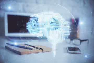 Multi exposure of work space with computer and human brain hologram. Brainstorm concept.