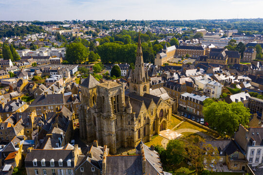 Aerial view of historic centre of Guingamp overlooking ancient Basilica of Notre Dame de Bon Secours, Brittany, France