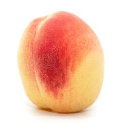 Ripe peach isolated on a white background.