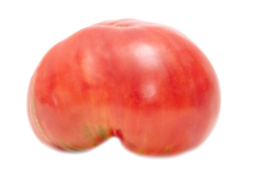 Red ripe tomato isolated on a white background.