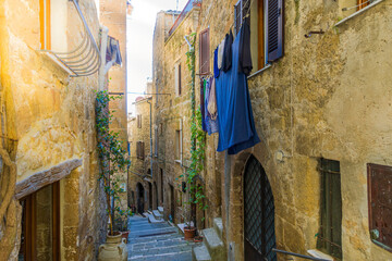 Pitigliano, Tuscany perched on tuff cliff, Old Town and alleys. Splendid town in the Tufo Area, in...