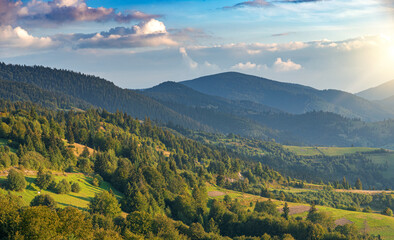 Beautiful sunset on the background of the mountain landscape. Carpathians.