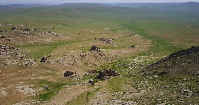 overflight over the hills in the steppe of Mongolia, 13th century national park