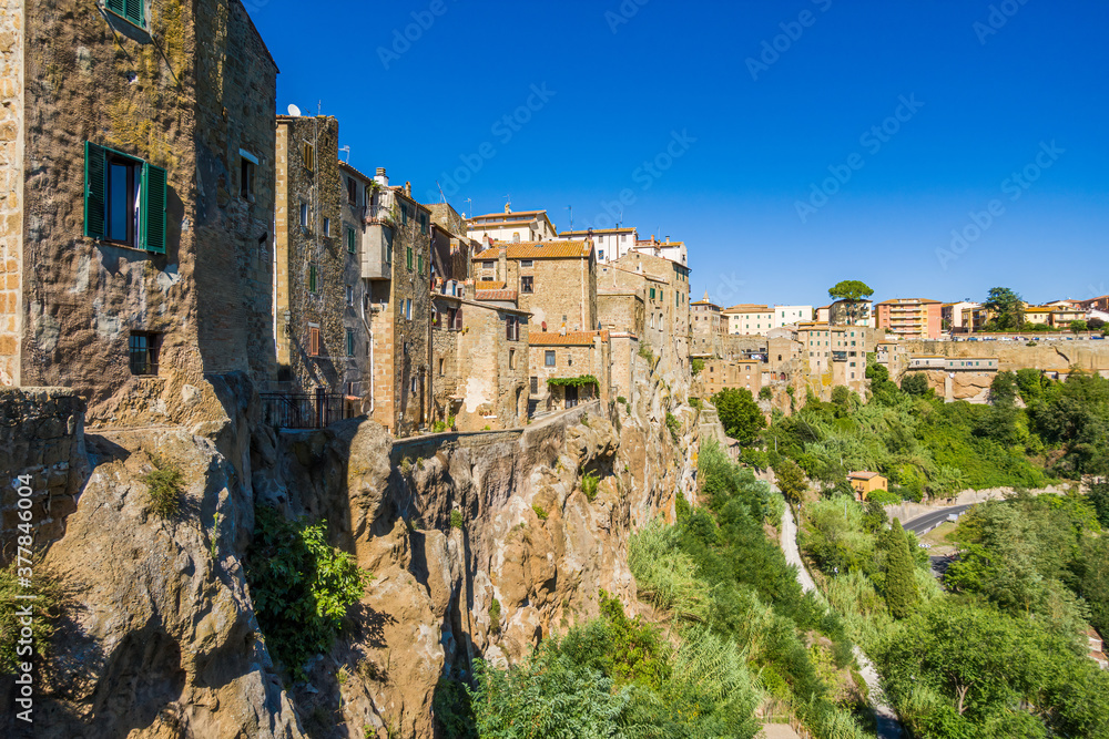 Wall mural pitigliano, tuscany perched on tuff cliff, old town and alleys. splendid town in the tufo area, in t