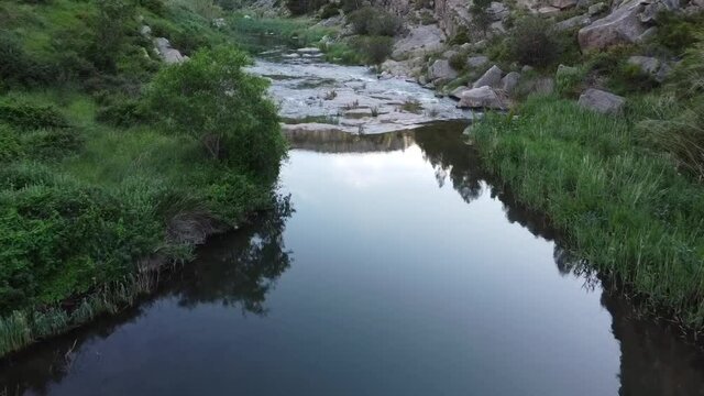 quiet Waters of Palancia river, Jerica, Spain. autumn&acute;s  day light.