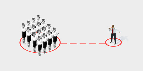 Studio shot of people demonstrating social distancing with arrows indicating the separation. Office workers during coronavirus outbreak with new rules for safety and healthcare. High angle view