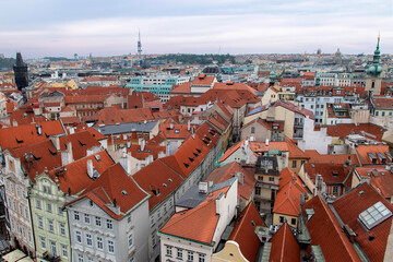 Fototapeta na wymiar The red roofs of Prague. View from the Old Town Hall