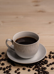 warm cup of coffee on brown background
