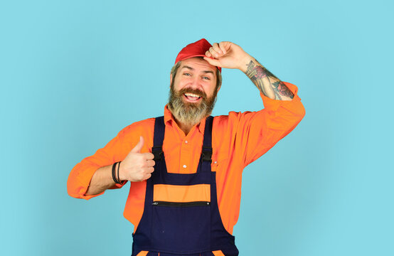 Fixing broken technics at home. Electrician plumber handyman. Call master. Renovation concept. Man skillful worker. Laborer. Repairman experienced worker. Help services. Handsome construction worker