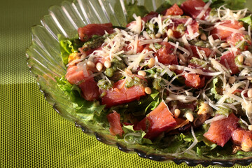 Seafood salad with pesto and pine nuts.