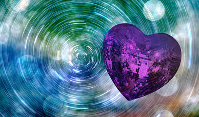 Star trails of heart shape Love symbol with Heart Shaped Disco Ball
