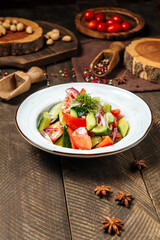 Fresh vegetables salad with tomatoes and cucumbers