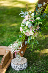 Fresh flower decoration of a wedding arch - pink and white fresh flowers. Fresh roses flower arrangement