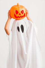 Funny Halloween Kid Concept, little cute child with white dressed costume halloween ghost scary he...