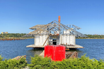 river or lake house building, home on the water construction