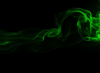 Green smoke abstract on black backgroud for design