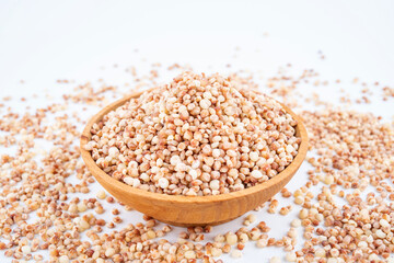 Grain grain sorghum rice in a dish on white background