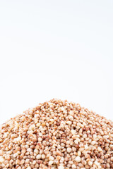 A pile of cereal grain sorghum rice on white background