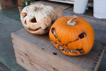 Jack o lantern pumpkins on the roadside, October Halloween autumn.